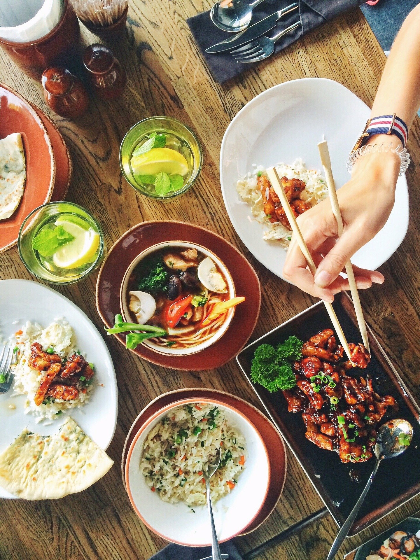 Selection of restaurant foods on table