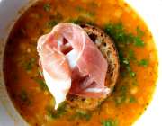 Chickpea and chorizo soup with soda bread and prosciutto ham