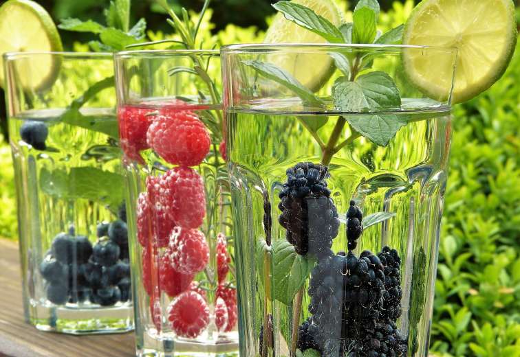 Glasses of summer fruit flavoured water